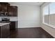 Eat-in kitchen with a large window and stainless steel appliances at 2231 Bedell Dr, Conyers, GA 30094