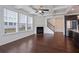 Bright living room features coffered ceilings, fireplace, and hardwood floors at 2231 Bedell Dr, Conyers, GA 30094