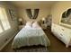 Bright bedroom with a king-size bed, dresser, and natural light at 276 Colewood Nw Way, Atlanta, GA 30328