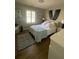 Serene bedroom featuring a plush bed and abundant natural light at 276 Colewood Nw Way, Atlanta, GA 30328