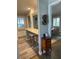 Open space featuring bar seating area flowing into dining room at 276 Colewood Nw Way, Atlanta, GA 30328