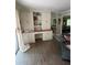 Bright home office features custom built-ins and hardwood floors at 276 Colewood Nw Way, Atlanta, GA 30328