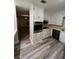 Cozy kitchen featuring stainless steel oven, appliances, and ample cabinetry at 276 Colewood Nw Way, Atlanta, GA 30328