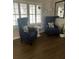 Comfortable living room featuring a pair of plush chairs and natural light at 276 Colewood Nw Way, Atlanta, GA 30328