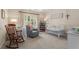 Cozy Bedroom with a rocking chair, crib, window views and soft natural light at 4789 Crest Park Ln, Marietta, GA 30068