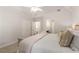 Bedroom with a tray ceiling, ceiling fan, and a walk-in closet at 4789 Crest Park Ln, Marietta, GA 30068