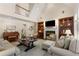 Living room with fireplace and built-in bookshelves at 4789 Crest Park Ln, Marietta, GA 30068