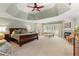 Expansive main bedroom featuring a trey ceiling, sitting area, and fireplace at 4789 Crest Park Ln, Marietta, GA 30068