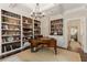 Inviting home office with custom built-ins, a large desk, and neutral decor for a productive workspace at 4789 Crest Park Ln, Marietta, GA 30068