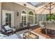 Inviting outdoor patio area with comfortable seating and ample sunlight, perfect for relaxation and entertaining guests at 4789 Crest Park Ln, Marietta, GA 30068