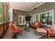 Charming patio features comfortable seating, string lights and a serene backyard view at 4789 Crest Park Ln, Marietta, GA 30068