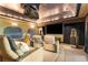 Home theater room with reclining leather seating and a large screen at 4789 Crest Park Ln, Marietta, GA 30068