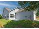Exterior shot of the backyard, siding, patio, and grassy lawn at 903 Duncan Ter, Canton, GA 30115