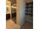 Bathroom with sink, shower, and shelves at 12 Barrington Ct, Sharpsburg, GA 30277