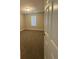 Cozy bedroom with neutral walls, plush carpeting and natural light at 12 Barrington Ct, Sharpsburg, GA 30277