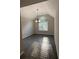 Dining room with large window providing natural light and modern tile flooring at 12 Barrington Ct, Sharpsburg, GA 30277