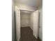 Functional laundry room with tiled floors, bright lighting, and storage space at 12 Barrington Ct, Sharpsburg, GA 30277