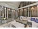 Cozy screened-in porch with comfortable seating and decorative lighting at 1595 Northcliff Trce, Roswell, GA 30076