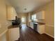 Modern kitchen featuring stainless steel appliances, granite countertops, and plenty of cabinet space at 425 Bell Flower Trl, Locust Grove, GA 30248