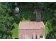 Aerial view of a fenced backyard with a storage shed and wooden deck at 106 Kimbell Farm Dr, Locust Grove, GA 30248
