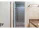 This bathroom contains a white shower curtain with sink and cabinets at 1225 Church St # M, Decatur, GA 30030