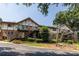 Exterior view of condo complex with well-maintained landscaping and stairs at 1225 Church St # M, Decatur, GA 30030