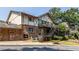 Charming brick apartment complex with Tudor details, private patios, and well-maintained landscaping at 1225 Church St # M, Decatur, GA 30030