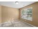 Bedroom with large window providing natural light at 2683 Berry Ridge Ct, Buford, GA 30519