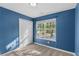 Bedroom featuring neutral carpet, closet, and a window with natural light at 2683 Berry Ridge Ct, Buford, GA 30519