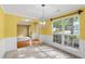 Elegant dining room featuring natural light, wainscoting, and an open layout at 2683 Berry Ridge Ct, Buford, GA 30519
