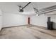 Spacious two-car garage with ample storage and a clean, organized layout at 2683 Berry Ridge Ct, Buford, GA 30519