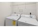 Laundry room with new washer and dryer at 2683 Berry Ridge Ct, Buford, GA 30519