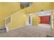 Open-concept living area featuring a staircase, bright walls, and views into the kitchen at 2683 Berry Ridge Ct, Buford, GA 30519