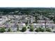 Aerial view of a well-maintained residential area with tree-lined streets and various home styles at 2283 Falmouth Se Ct # 22, Smyrna, GA 30080
