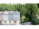 Aerial view of rooftops showing a mix of residences with landscaped yards and mature trees at 2283 Falmouth Se Ct # 22, Smyrna, GA 30080