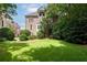 Inviting backyard with expansive lawn and charming brick building in a well-manicured setting at 2283 Falmouth Se Ct # 22, Smyrna, GA 30080