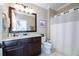Updated bathroom with granite counters, wood vanity and tiled shower at 2283 Falmouth Se Ct # 22, Smyrna, GA 30080