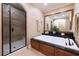 Luxurious bathroom featuring a soaking tub with a decorative tile shower at 2283 Falmouth Se Ct # 22, Smyrna, GA 30080