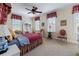 Charming bedroom with natural light, a ceiling fan, and carpeted floors at 2283 Falmouth Se Ct # 22, Smyrna, GA 30080