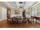 Formal dining room with elegant coffered ceilings, wainscoting, and ample natural light at 2283 Falmouth Se Ct # 22, Smyrna, GA 30080