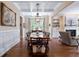 Elegant dining room features a coffered ceiling, large window, and a long table perfect for entertaining at 2283 Falmouth Se Ct # 22, Smyrna, GA 30080
