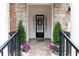 Inviting front entrance with decorative details and manicured plants at 2283 Falmouth Se Ct # 22, Smyrna, GA 30080