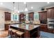 Gorgeous kitchen featuring a large island, stainless steel appliances, and plenty of cabinet space for storage at 2283 Falmouth Se Ct # 22, Smyrna, GA 30080