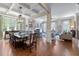 Open-concept living and dining area with coffered ceilings and abundant natural light at 2283 Falmouth Se Ct # 22, Smyrna, GA 30080