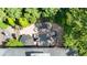 Overhead view of a brick patio featuring comfortable outdoor seating surrounded by lush greenery at 2283 Falmouth Se Ct # 22, Smyrna, GA 30080