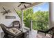 Relaxing porch featuring comfortable seating and wooded views at 2283 Falmouth Se Ct # 22, Smyrna, GA 30080