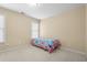 Bright bedroom with neutral walls, cozy carpet, and a window at 3053 Ramsey Pl, Marietta, GA 30062