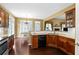 Stylish kitchen featuring granite countertops, stainless steel appliances, and dark wood cabinetry at 3053 Ramsey Pl, Marietta, GA 30062