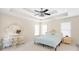 Bedroom features decorative furniture, a tray ceiling and two windows at 3053 Ramsey Pl, Marietta, GA 30062