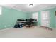 Office space with natural light, work desk, and carpeted floors at 3053 Ramsey Pl, Marietta, GA 30062